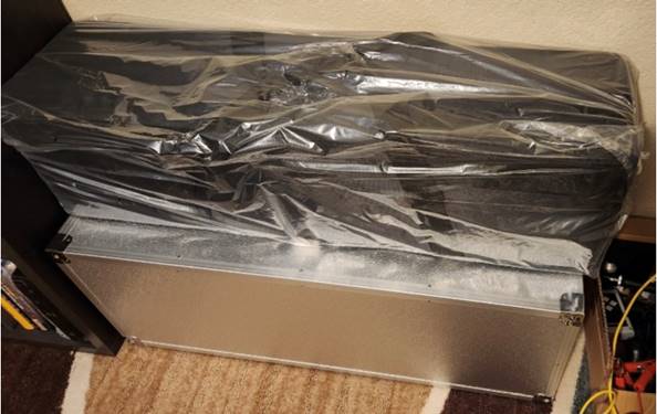 A picture containing packing materials, box, indoor, plastic bag

Description automatically generated