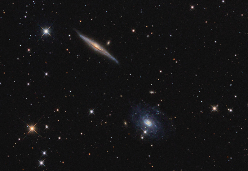 Two pairs of small galaxies in Draco with 7.5