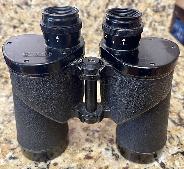 Cleaning store binoculars internally